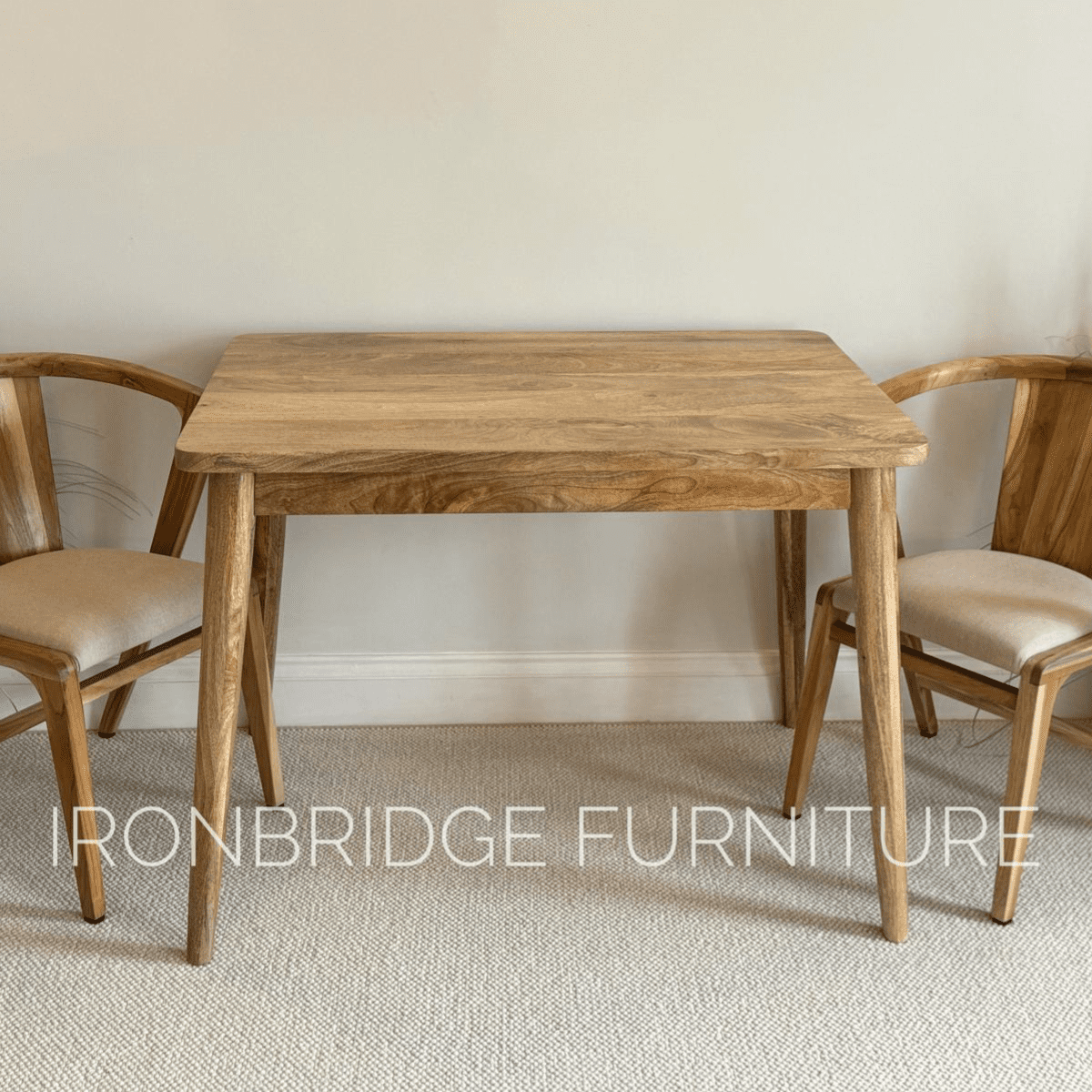 100 x 70cmSquare Mango dining table with cone shaped legs in a dining room