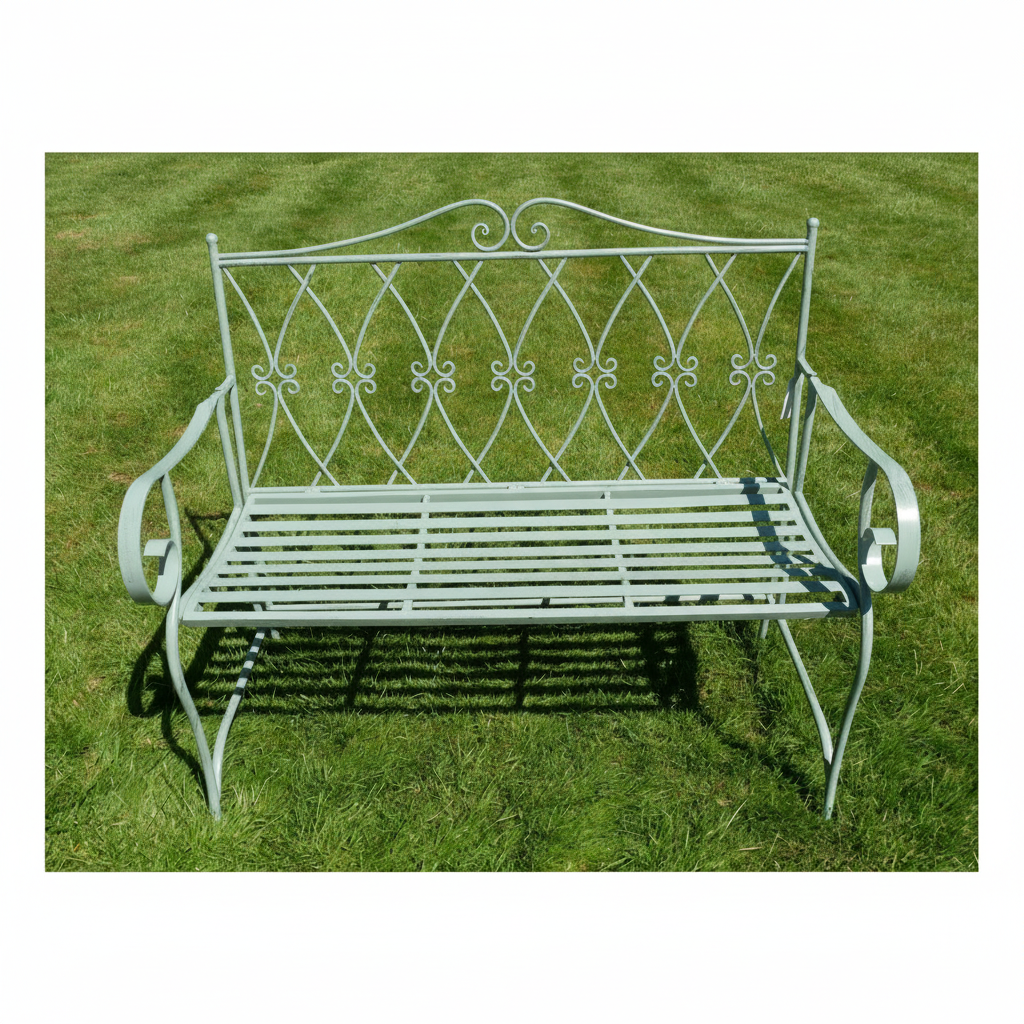 Decorative metal garden bench on a grassy background