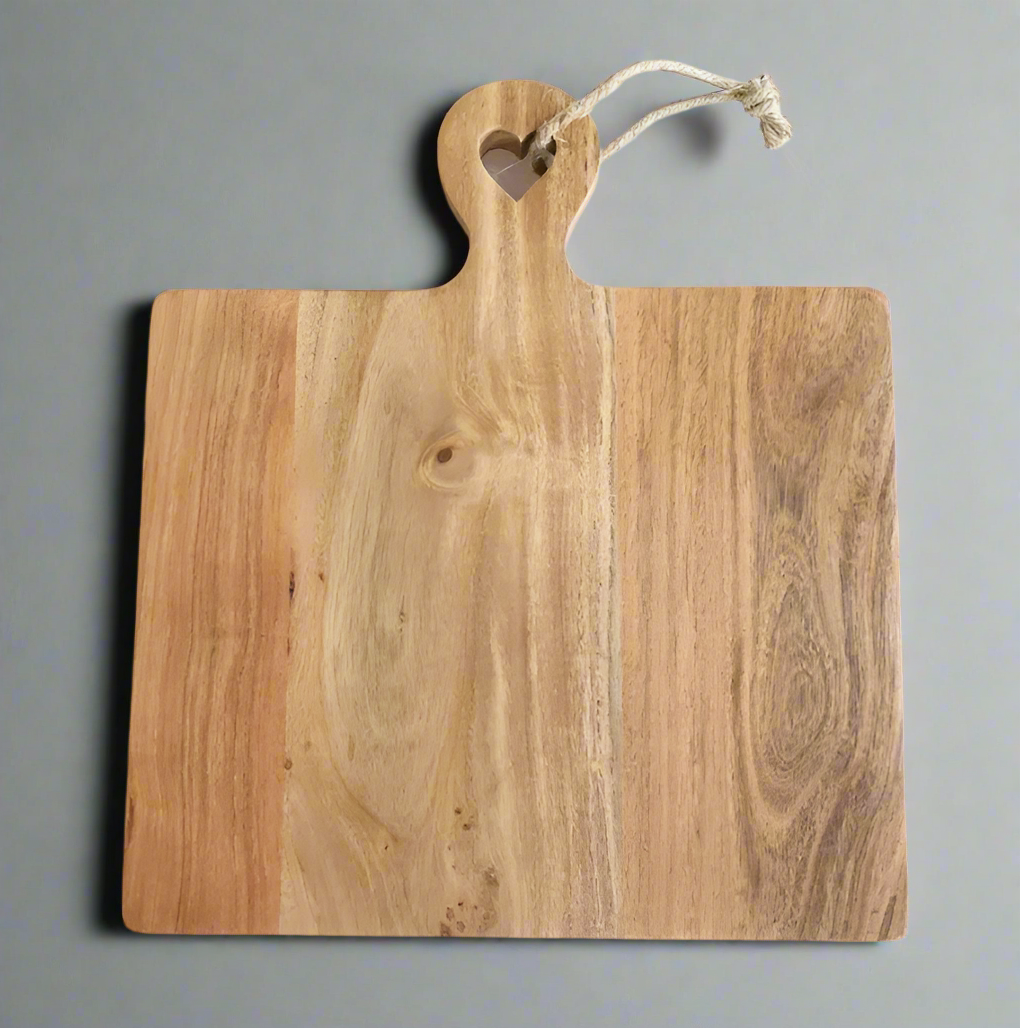 Wooden cutting board with a handle on a white background