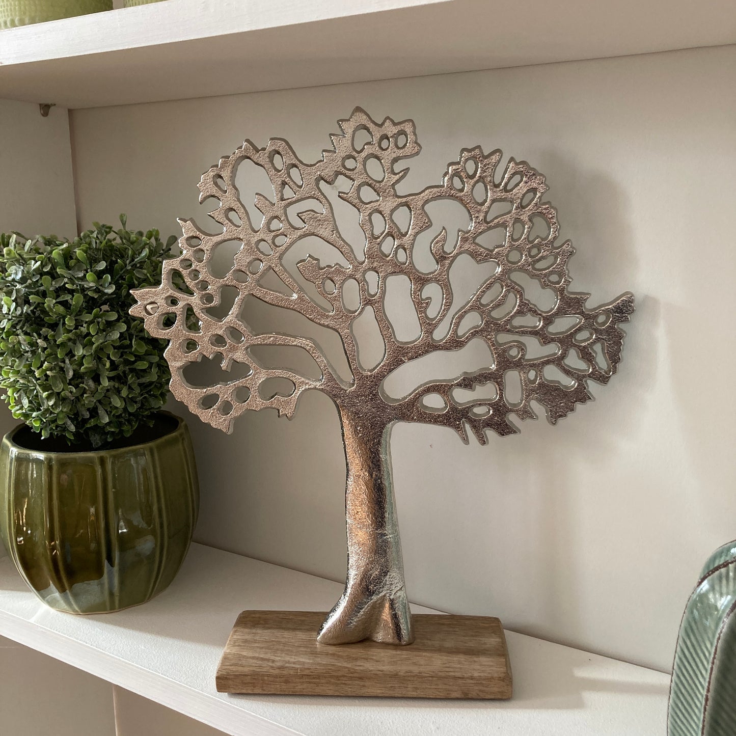 Tree of Life ornament on Mango wood plinth - side view.