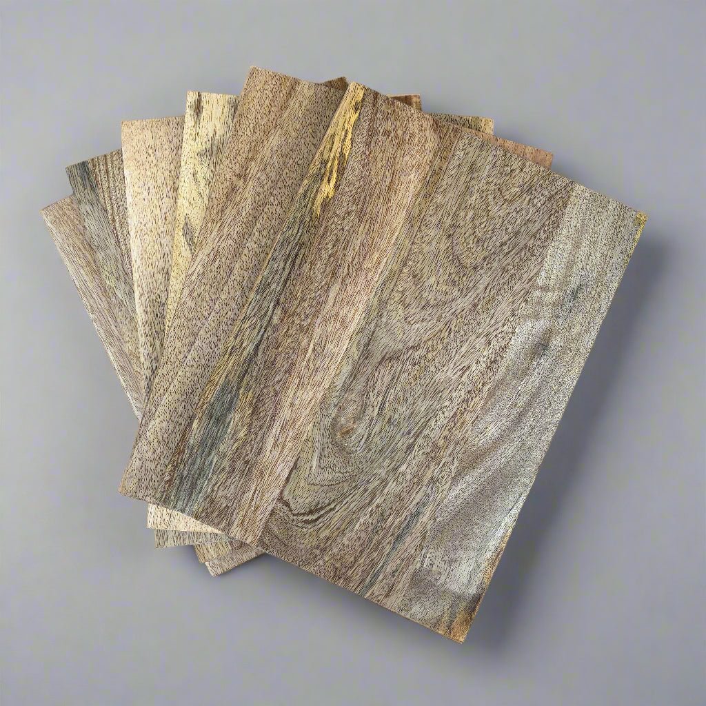 Stack of wooden samples on a gray background