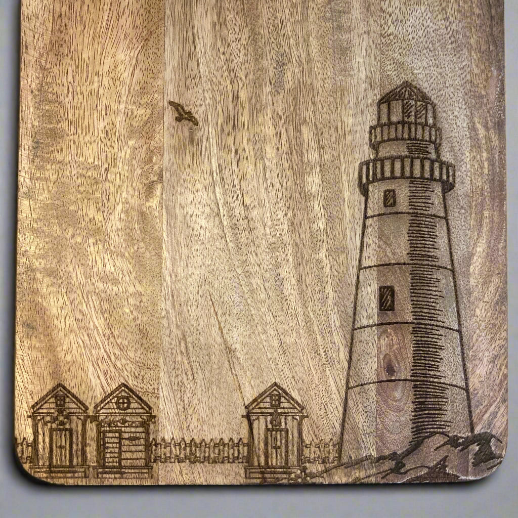 Solid Mango Hand Made Lighthouse Etched Chopping Board close up