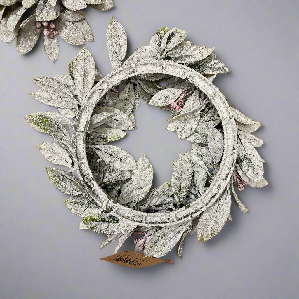 underside of a Decorative leaf wreath on a white background