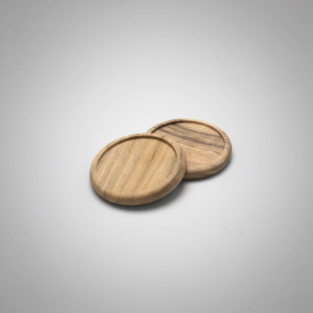 Two wooden coasters on a cardboard surface