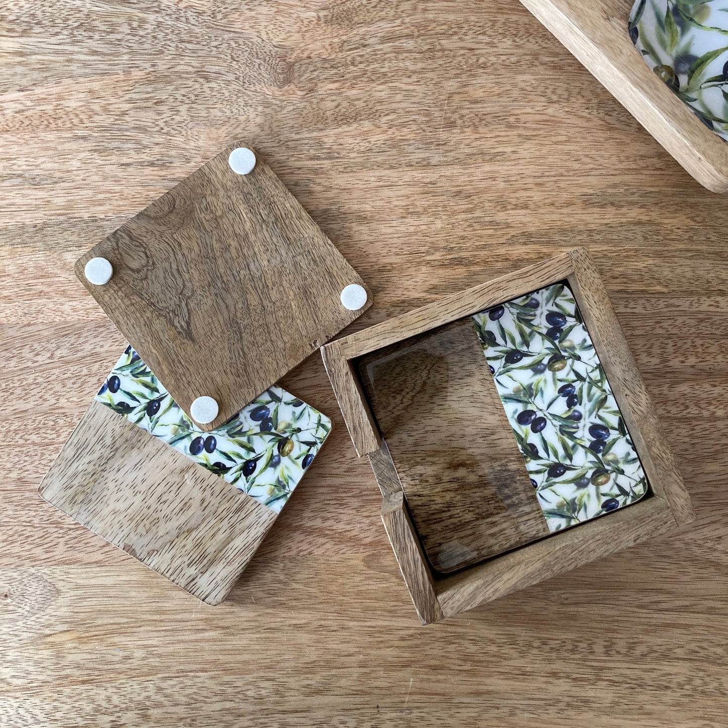 Solid 10cm square Olive Grove design Mango wood coasters in a holder - set of 4