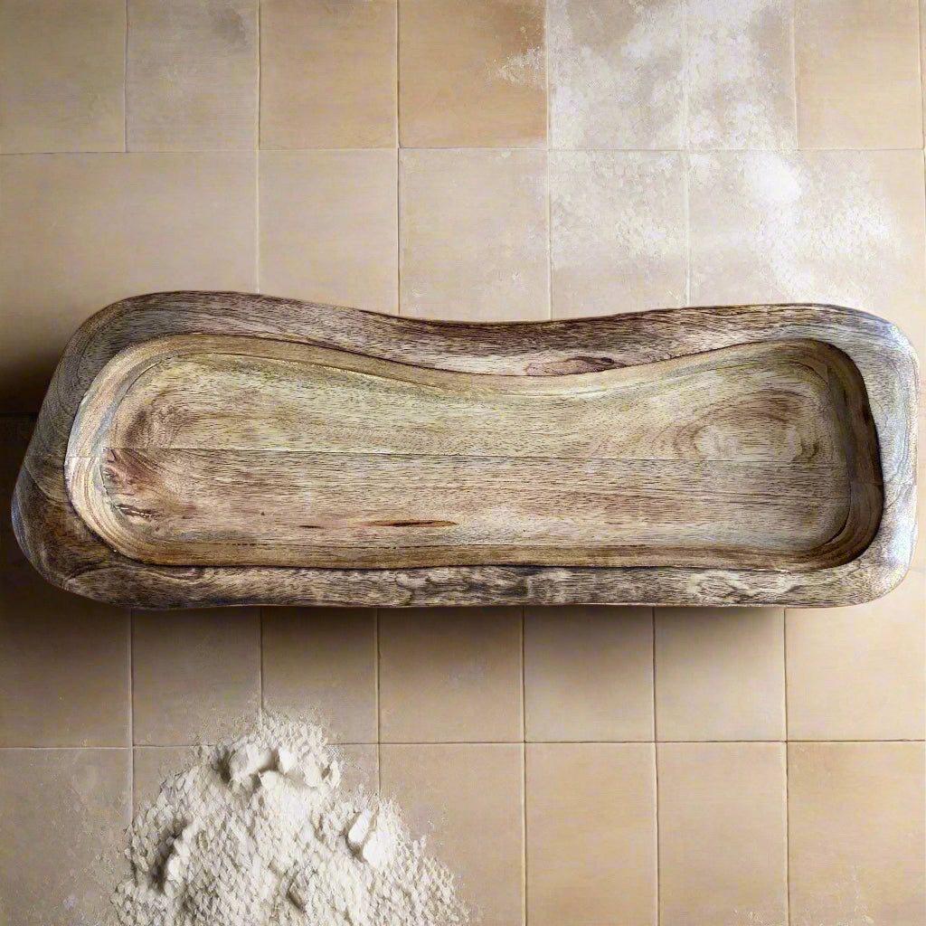 Wooden tray on a wooden surface