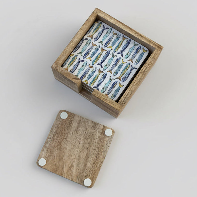 Wooden box with decorative items on a wooden surface
