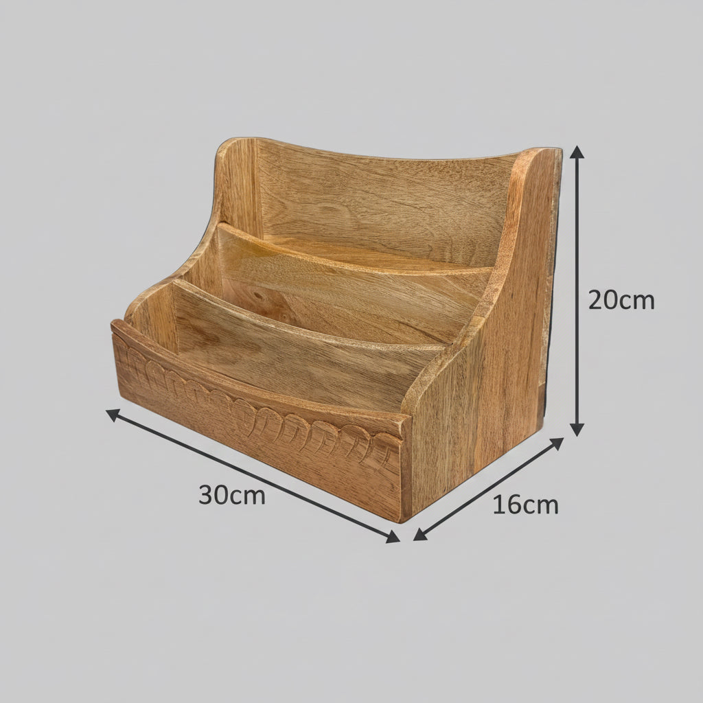 A three-tier wooden display shelf made from natural oak wood, resting on a white fabric-covered surface against a dark gray wall.