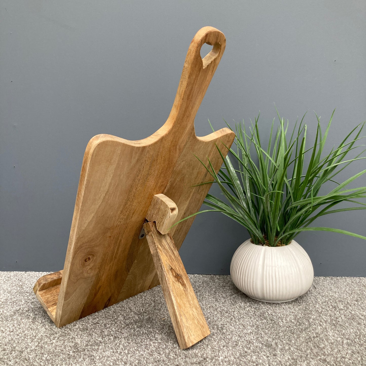 Tall Mango wood recipe stand with cut out heart handle. Back view.