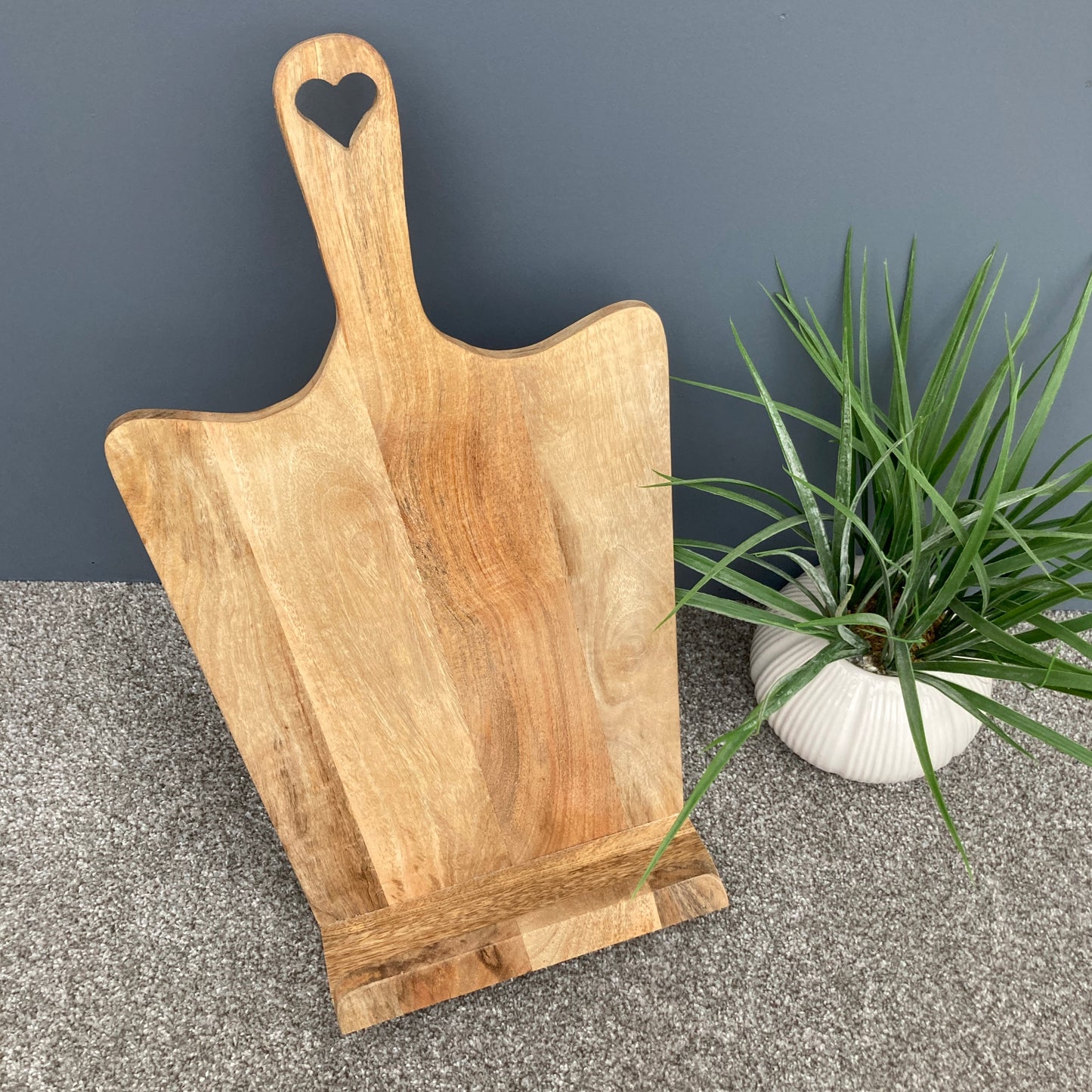 Tall Mango wood recipe stand with cut out heart handle. View from above.
