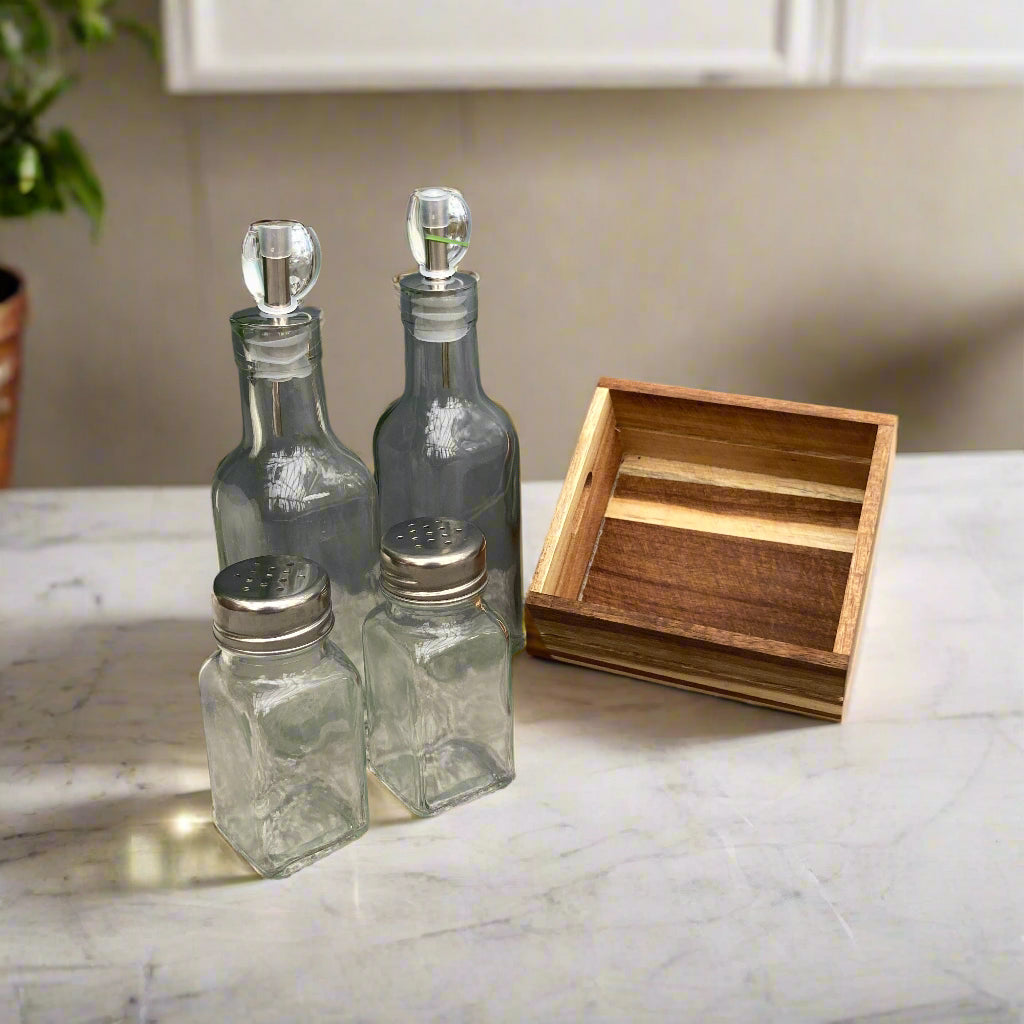 Acacia wood condiment tray. Salt & pepper shakers, oil & vinegar bottles included. Bottles placed outside of tray.