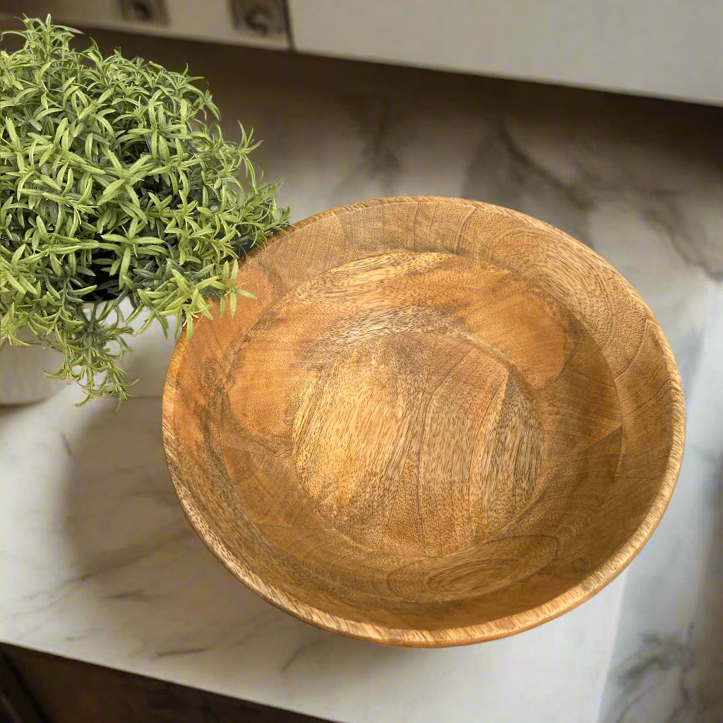 Beautiful Mango wood bowl in a kitchen setting on a worktop