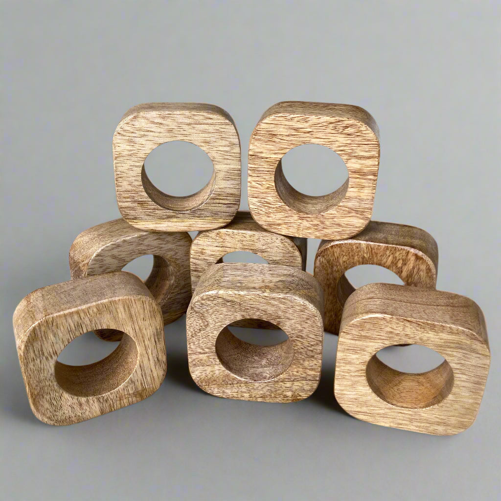 Set of solid Mango wood napkin rings. Multiple rings.