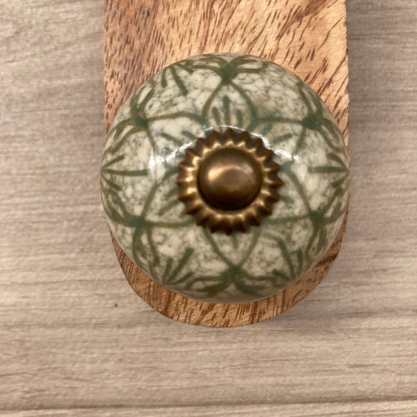 Mango wood door stop wedge with ceramic knob (Green variety) - close up of design D