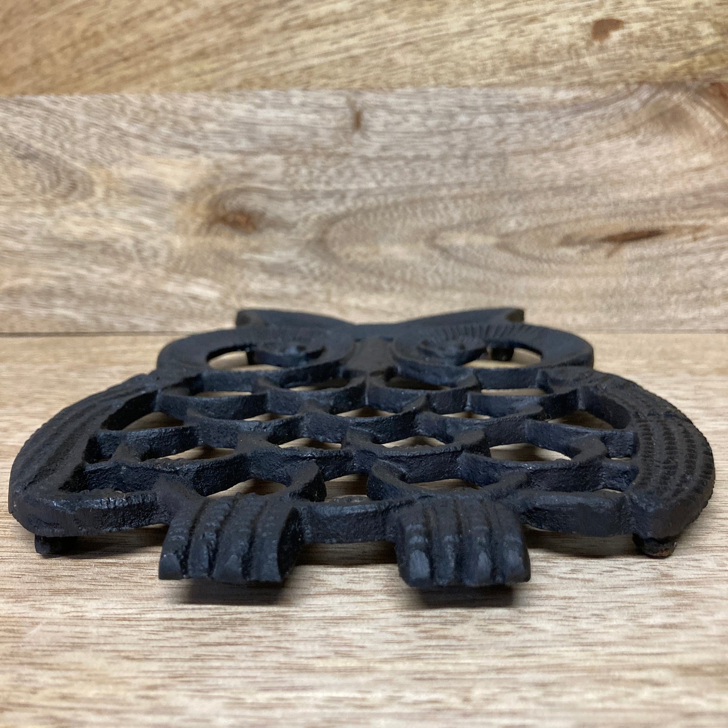 Black painted cast iron OWL design trivet / hotplate - laying down