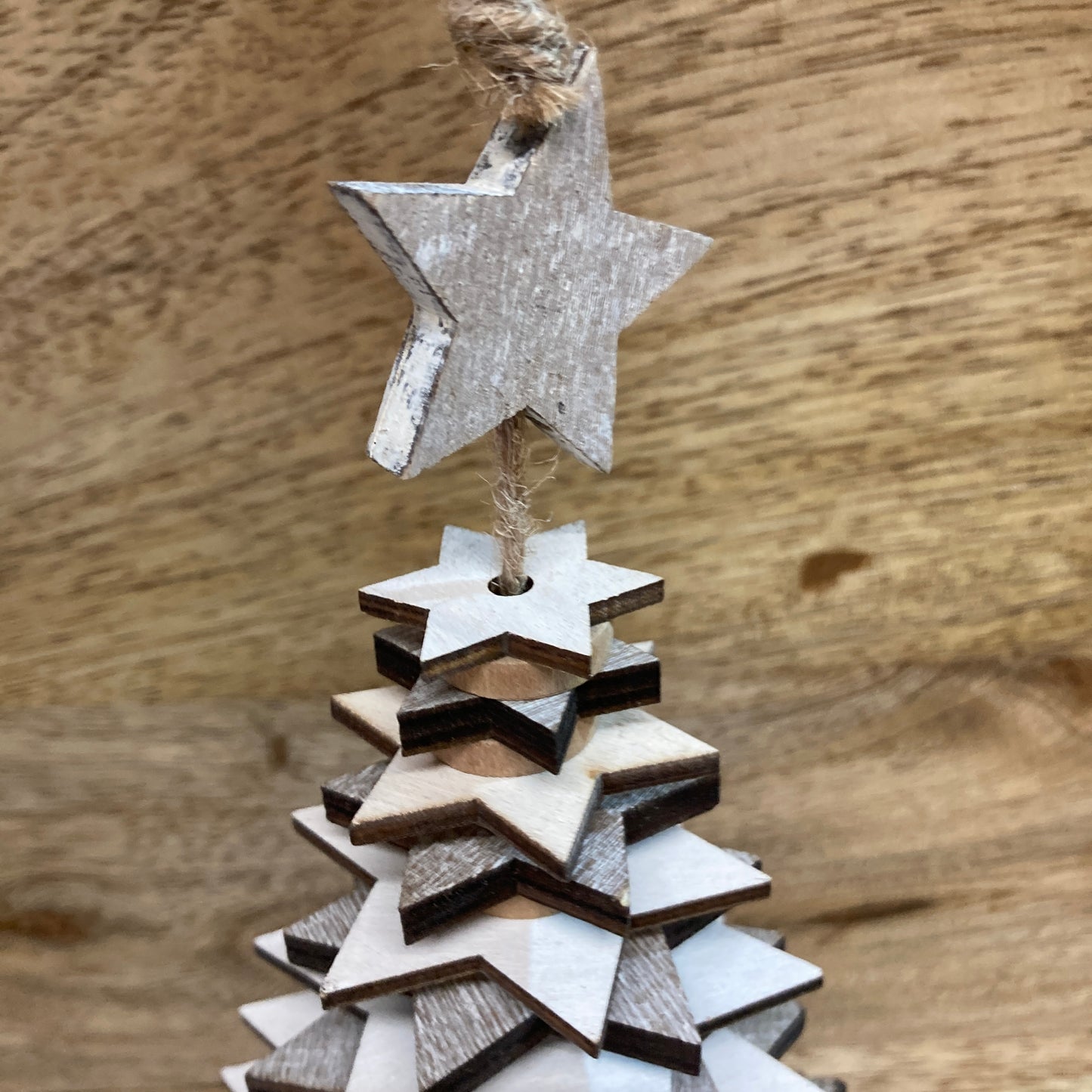Wooden star Christmas trees. Close up of star.