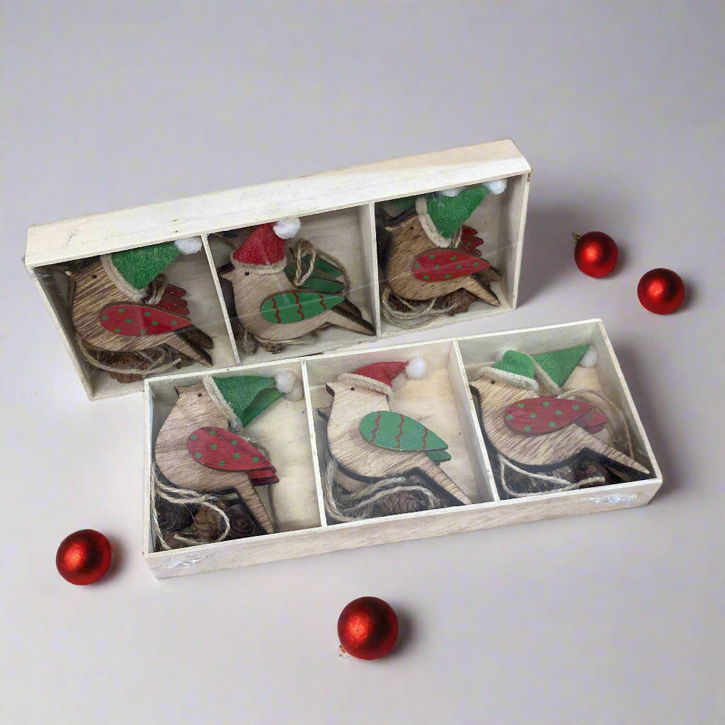 Hanging wooden robins in box
