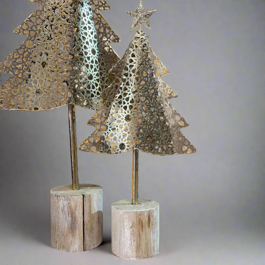 Gold metal Christmas tree on wood log base. Both sizes shown with a focus on the base.