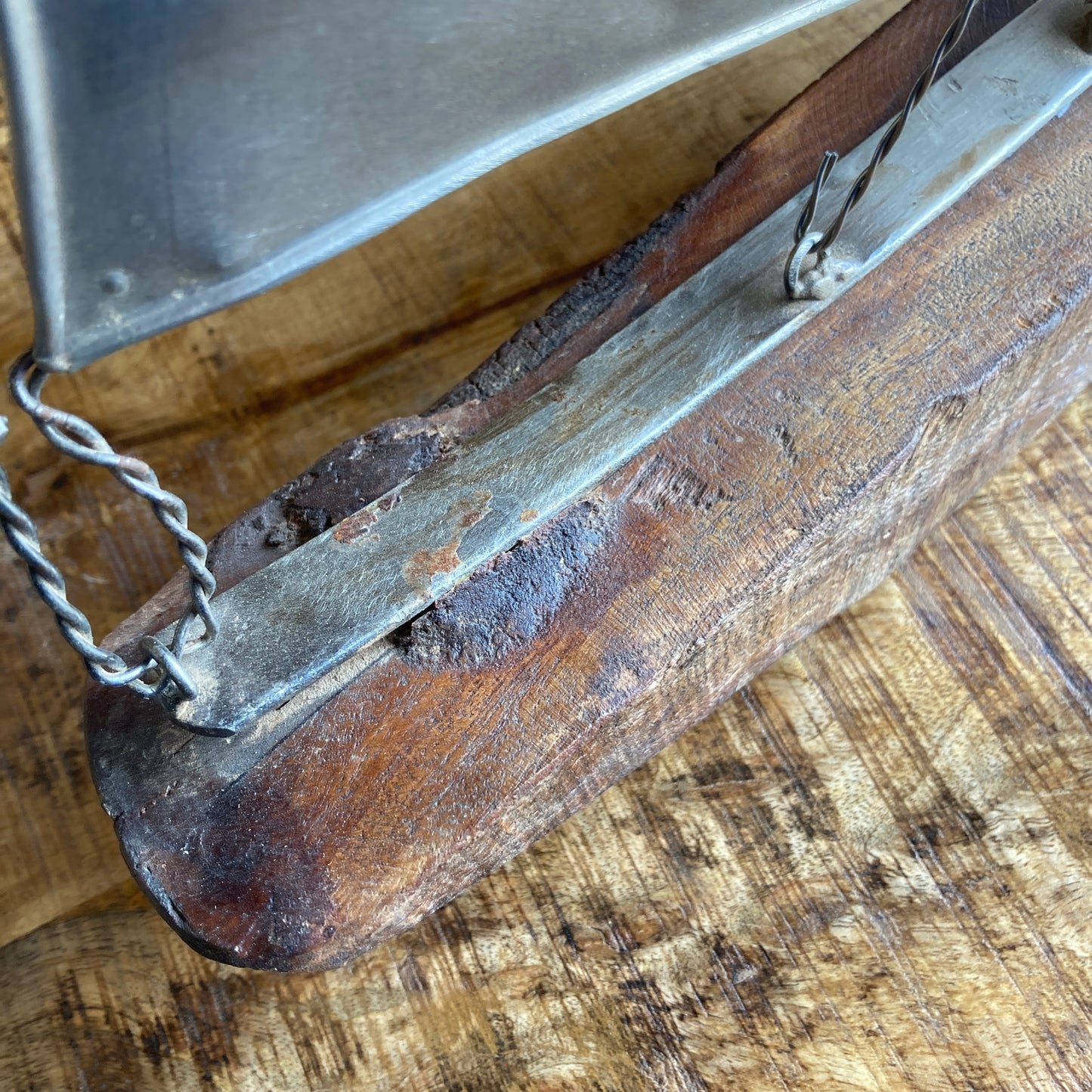 Large reclaimed rustic wood yachts with metal sail - close up of reclaimed base