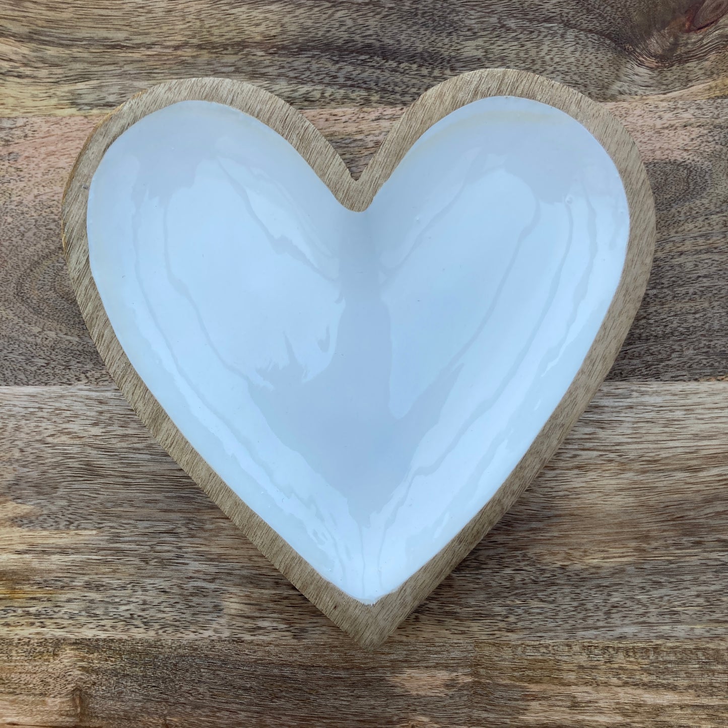 Solid Mango wood wooden heart dish / bowl lined with white enamel. Single heart shown.