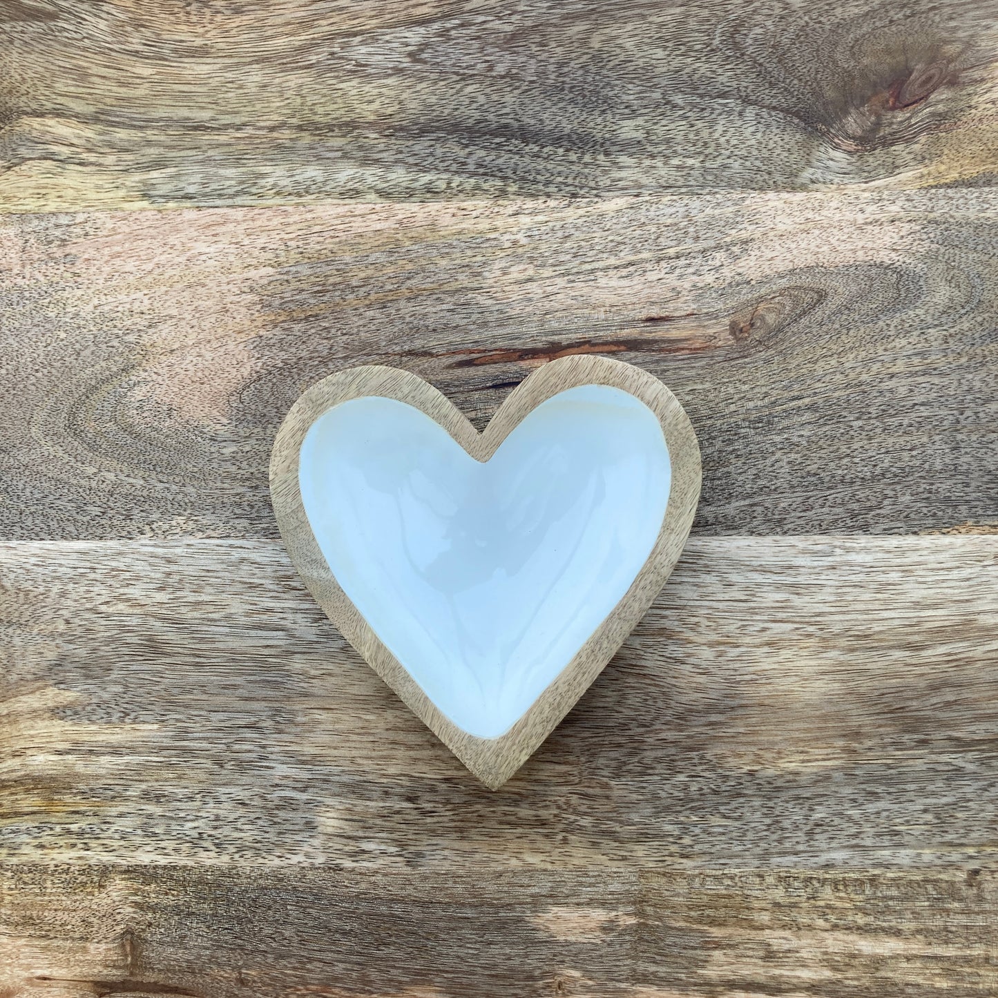 Solid Mango wood wooden heart dish / bowl lined with white enamel. Single small heart shown.