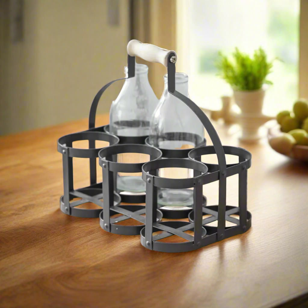 Black steel 6 bottle holder. Ideal for milk basket, wine rack, or condiments. With milk bottles on table.
