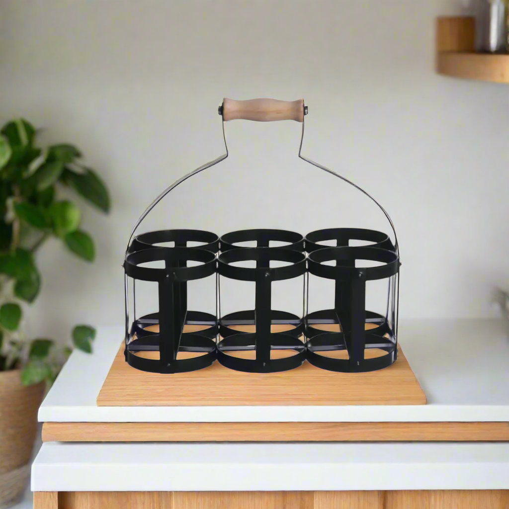 Black steel 6 bottle holder. Ideal for milk basket, wine rack, or condiments. Empty on table