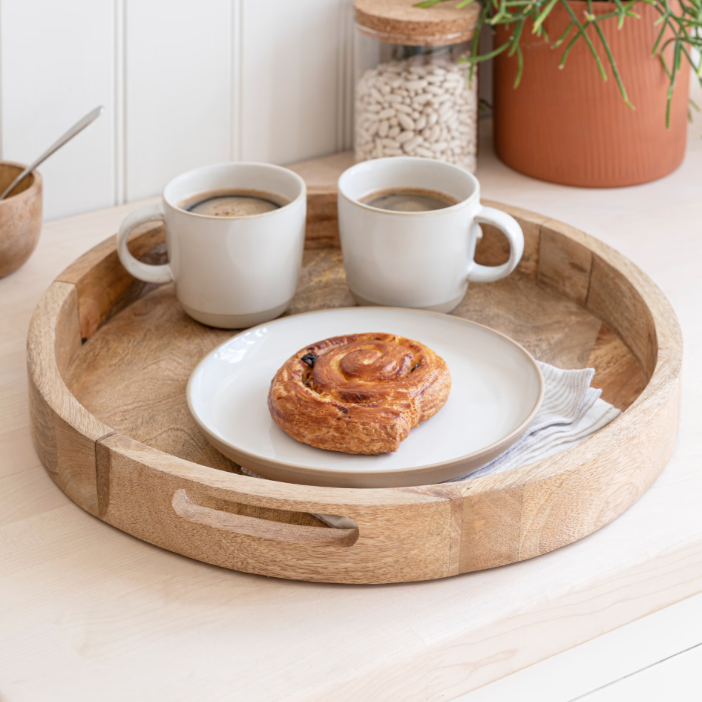Solid Mango wooden round tray as a tea tray