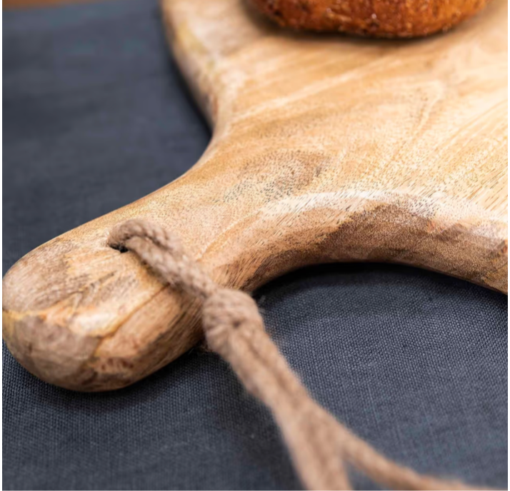 Large Mango wood chopping board close up
