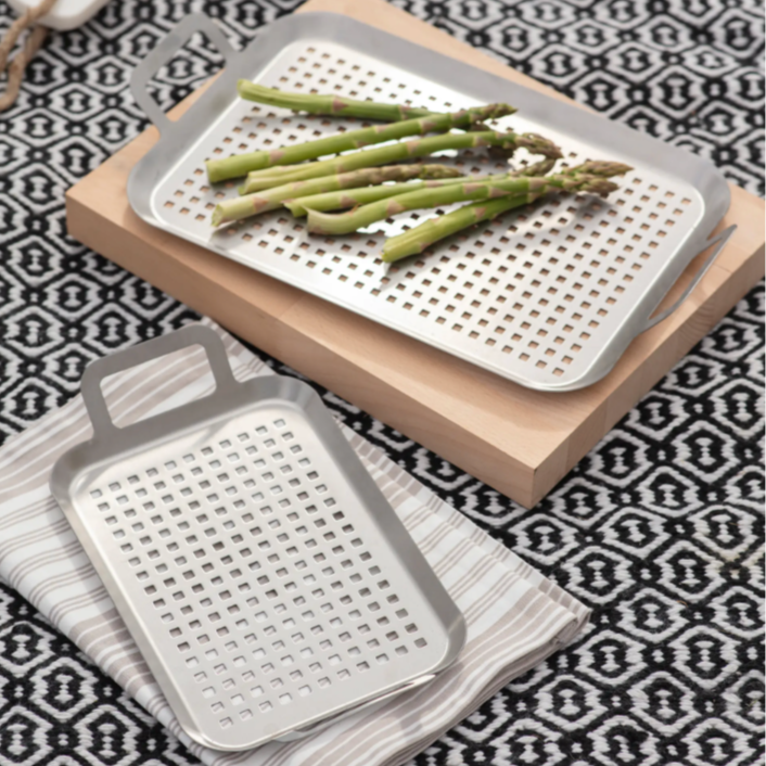 Set of 2 Stainless steel BBQ trays - on picnic blanket.