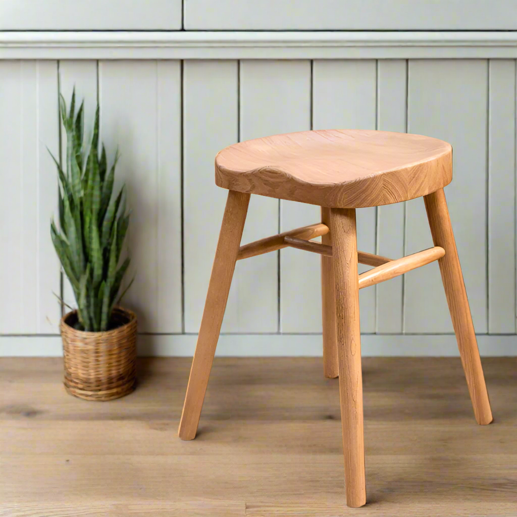 Small dining stool with heavy carved comfortable seat in ASH wood.