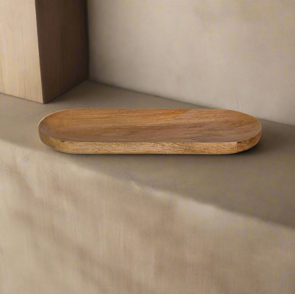 Wooden cutting board on a white background