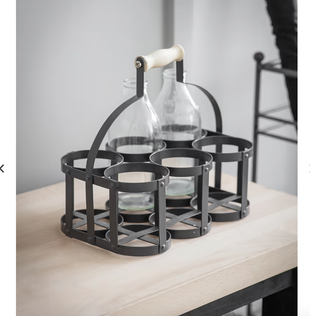 Black steel 6 bottle holder. Ideal for milk basket, wine rack, or condiments. With milk bottles.