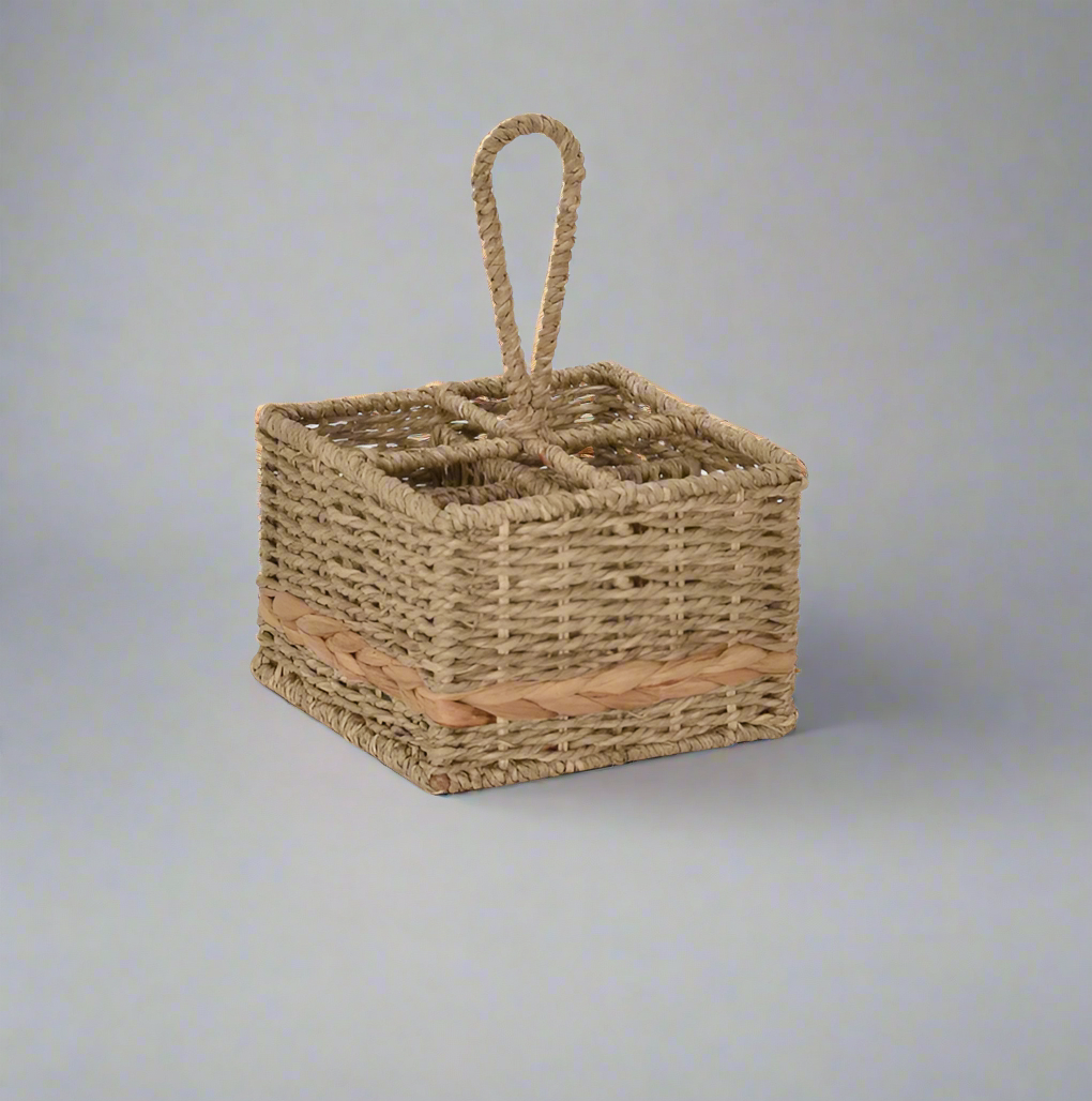 Woven seagrass and water hyacinth condiment caddy empty at an angle