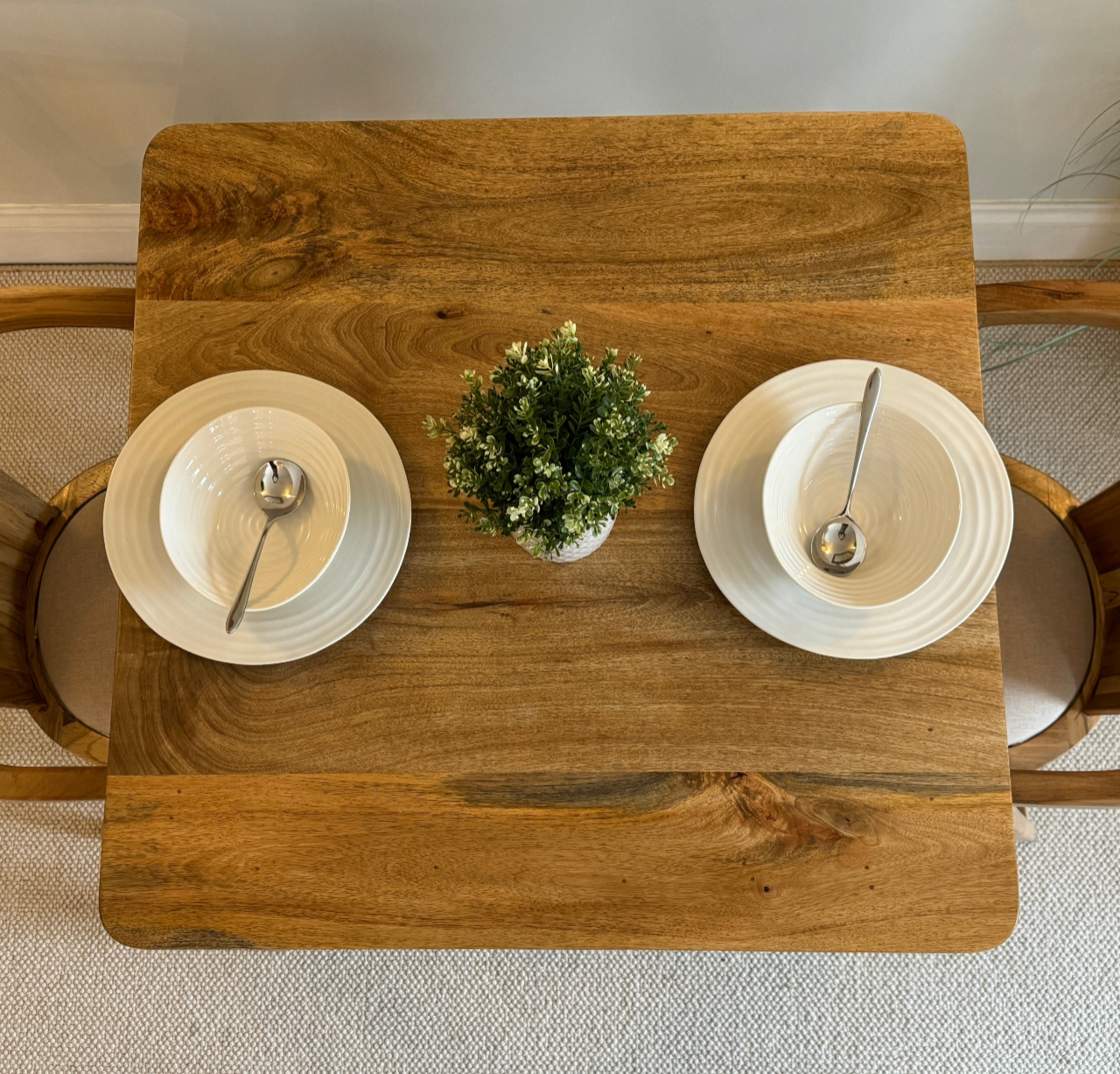 80cm Square Mango dining table with cone shaped legs dressed with 2 settings looking from the top