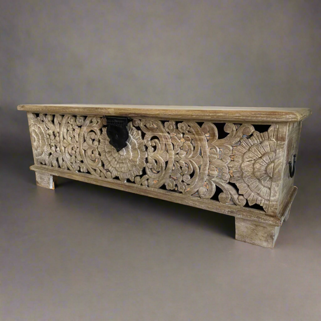 White washed with etched front long blanket style chest at an angle