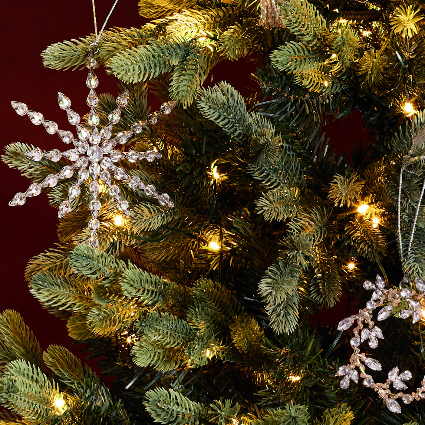 Snowflake and wreath together on christmas tree