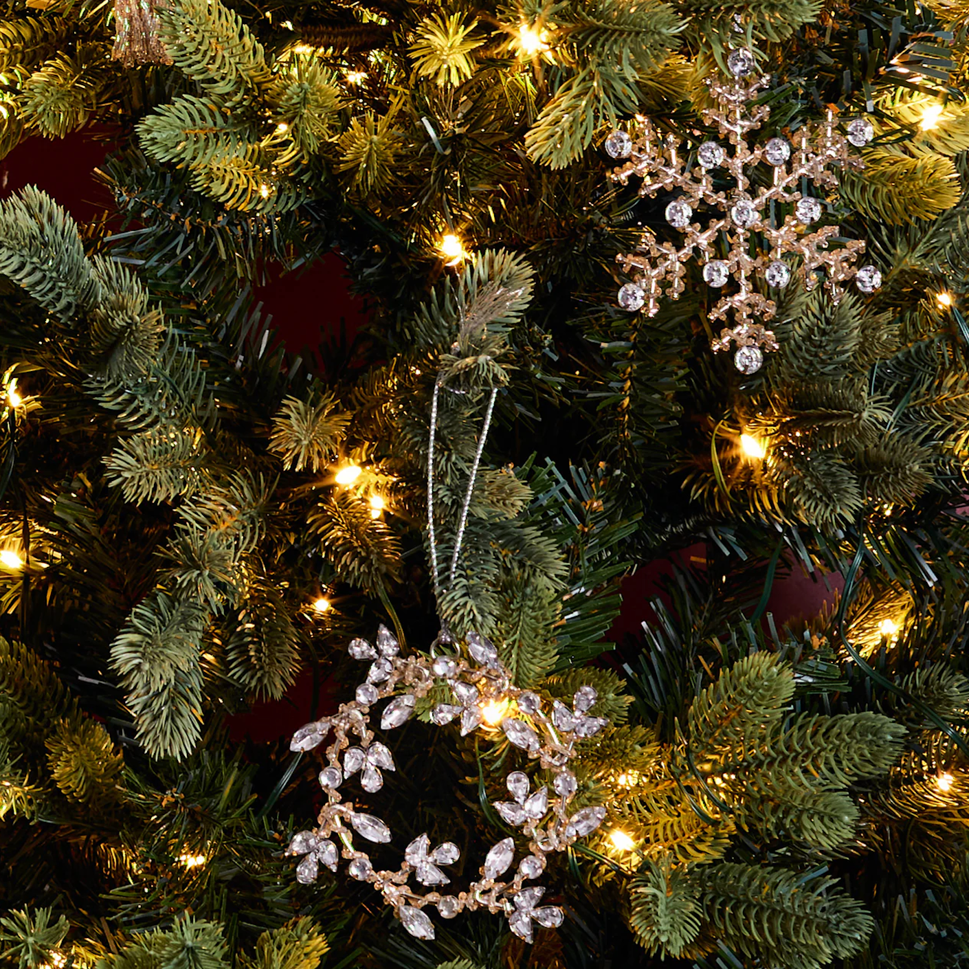 Snowflake and wreath together on christmas tree