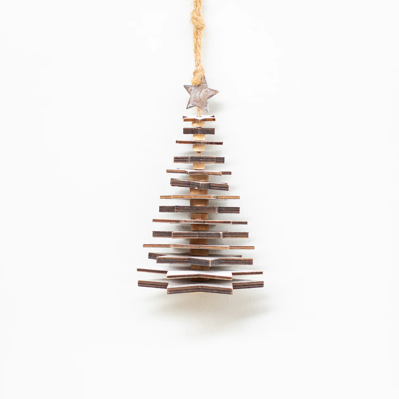 Wooden star Christmas trees on white background.