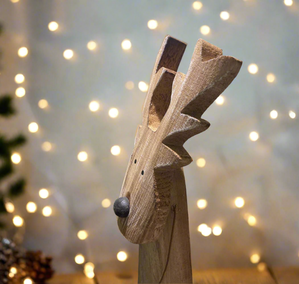 Floor standing reindeer decoration - wood with metal detail. Antler view.