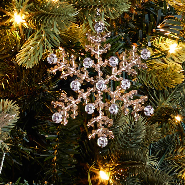 Hanging snowflake on christmas tree