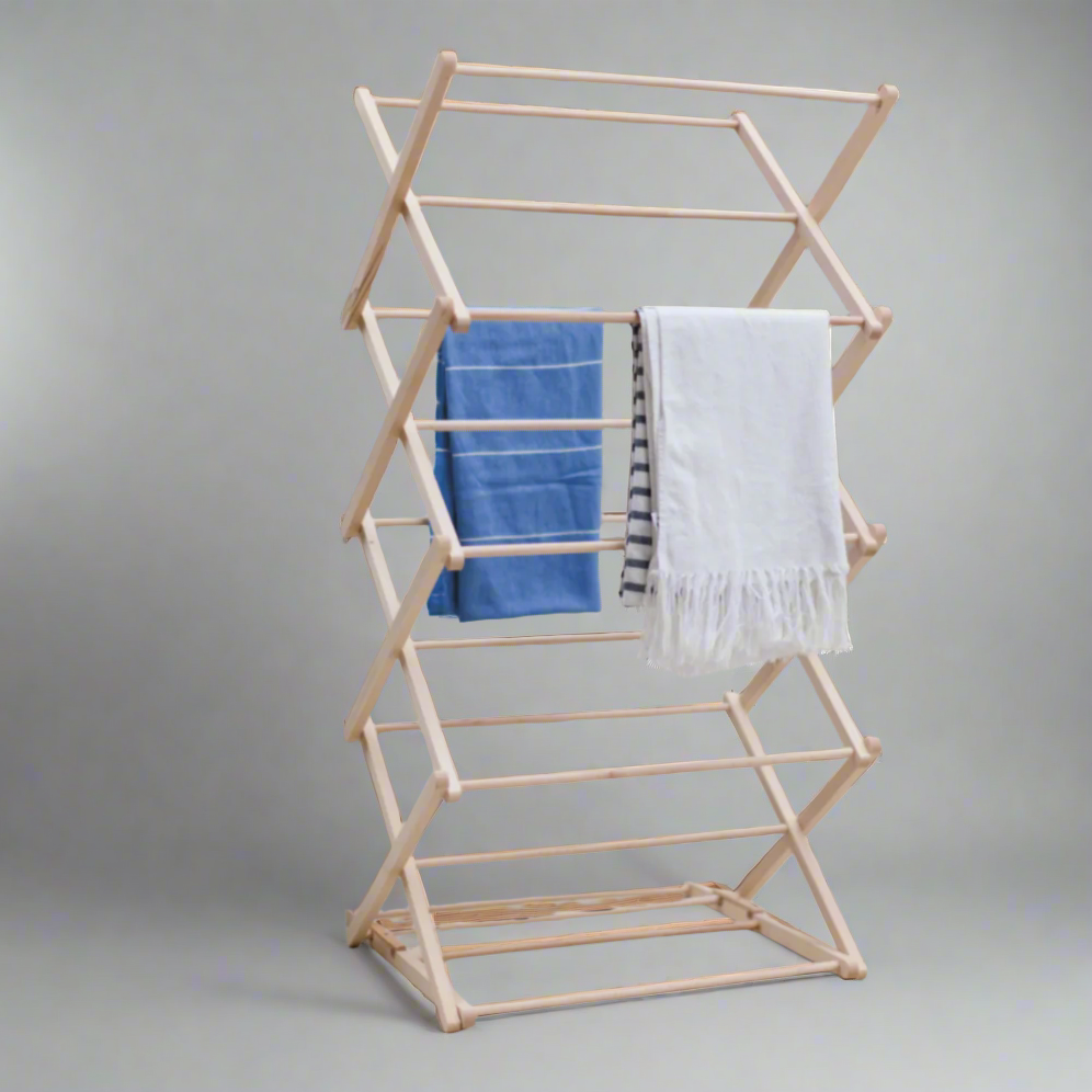 Natural Beech wood folding clothes horse with towels.