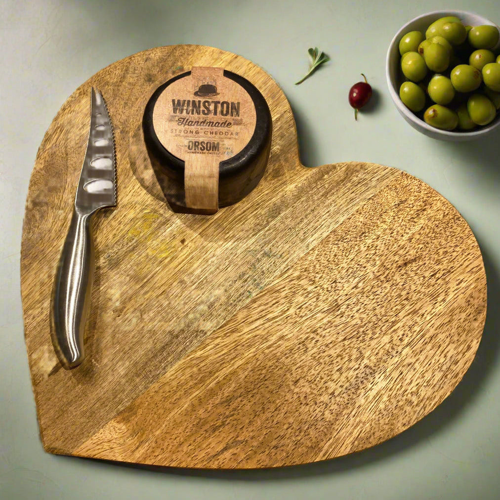 Large heart shaped Mango wood chopping board. Handle optional.