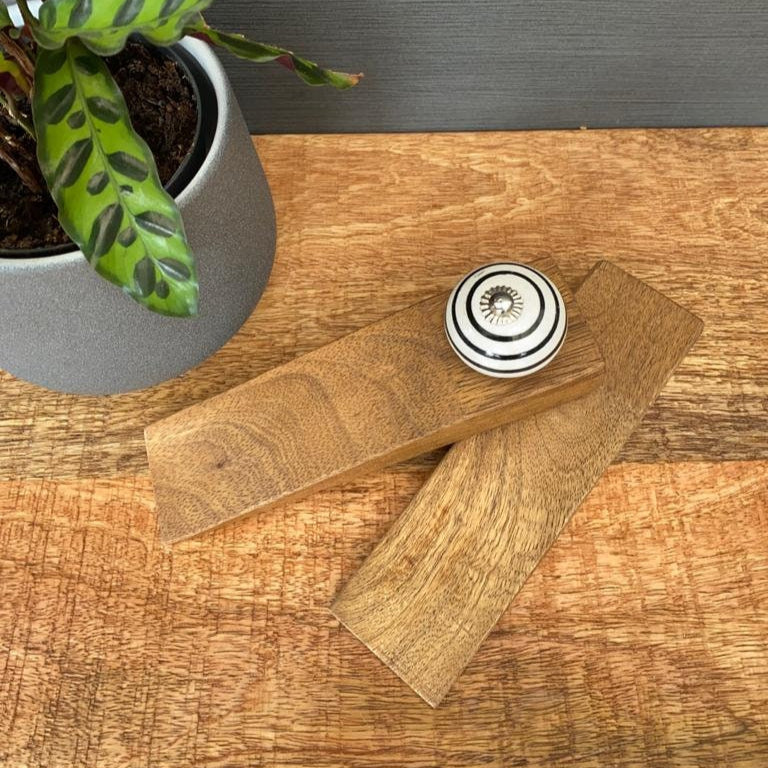 Mango wood door stop wedge. With or without ceramic knob handle. From above.