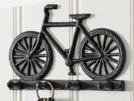 Black painted cast iron bike design set of hooks. Mounted.