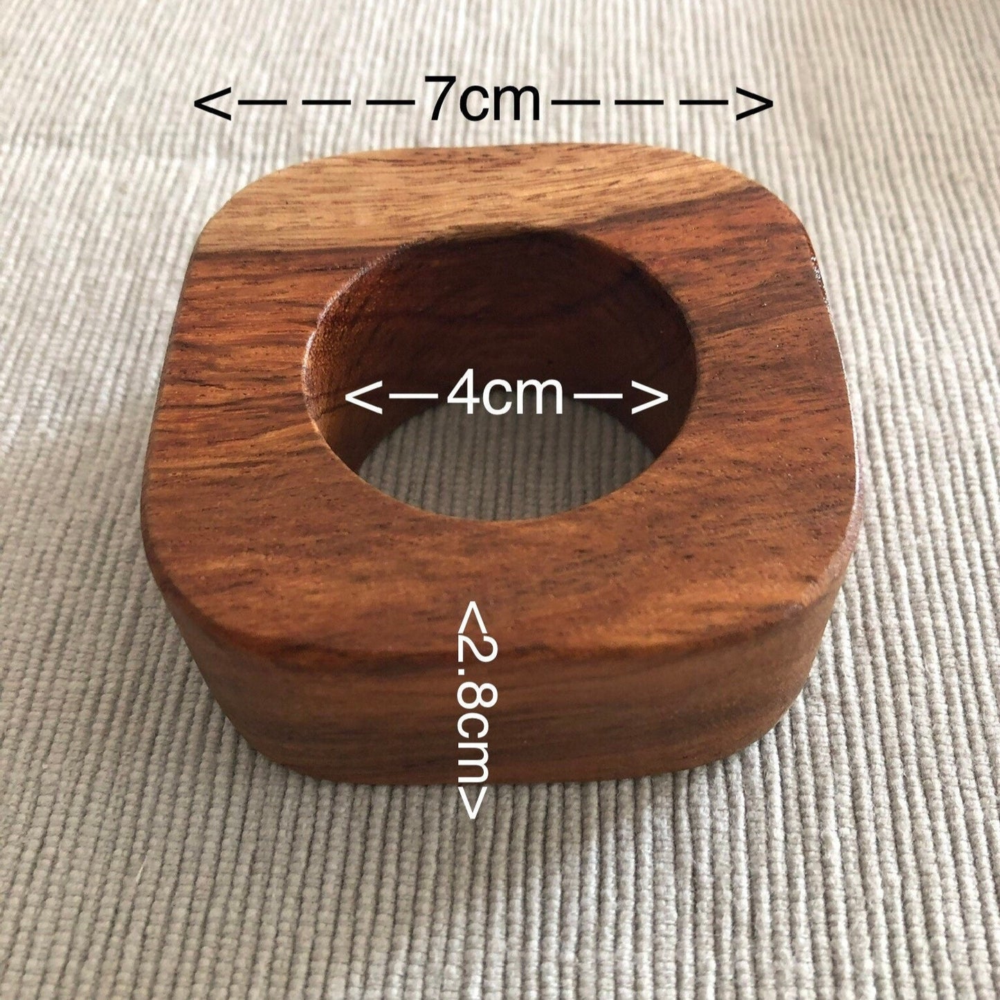 Set of solid Sheesham wood napkin rings with size dimensions.
