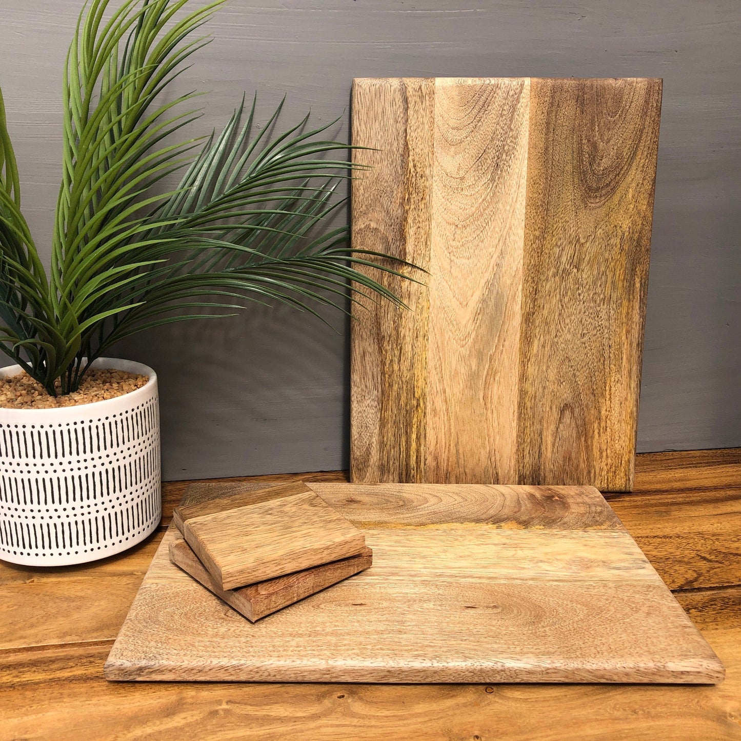 Set of Solid Mango Wood Board Placemats and Coasters. 2 placemats and 2 coasters.