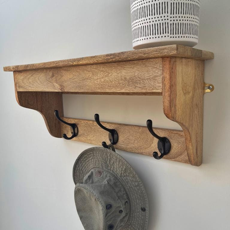 Mango wood 3 hook hat and coat rack with shelf, at an angle