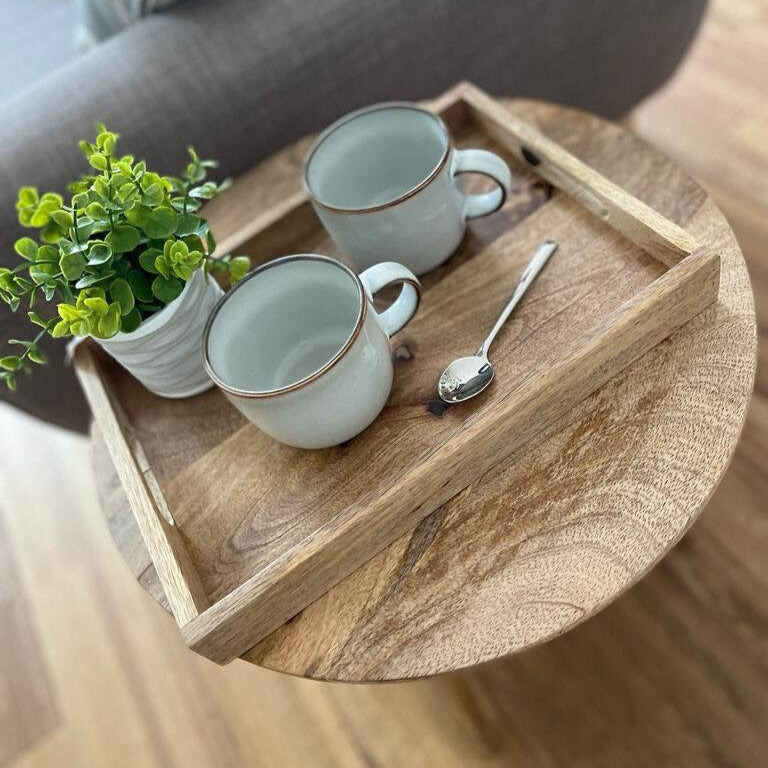 Mango wood straight edge tray with cut out handles. 35x25x4cm shown as a tea tray