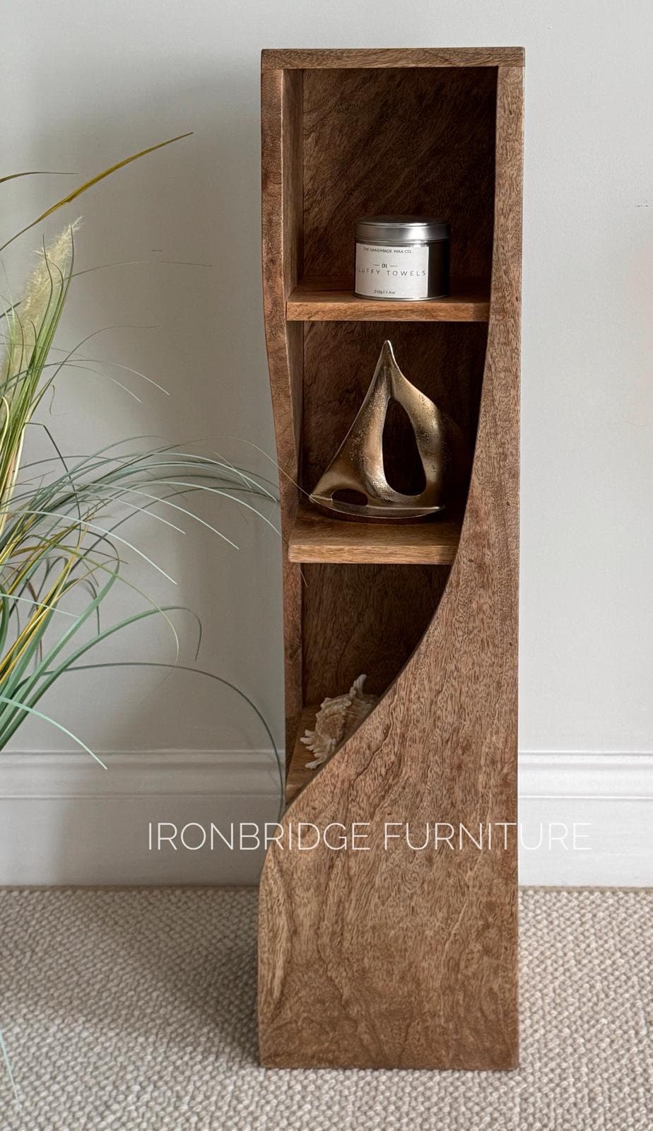 Slim Twisted Mango Wood Bookcase. From the side on.